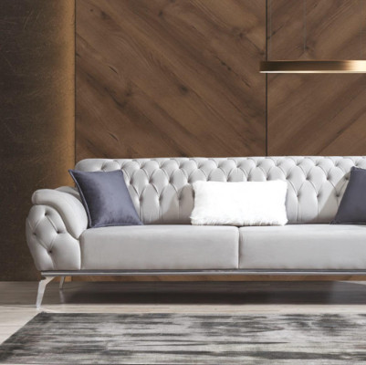 Sofá Chesterfield de tres plazas de lujo para amueblar.