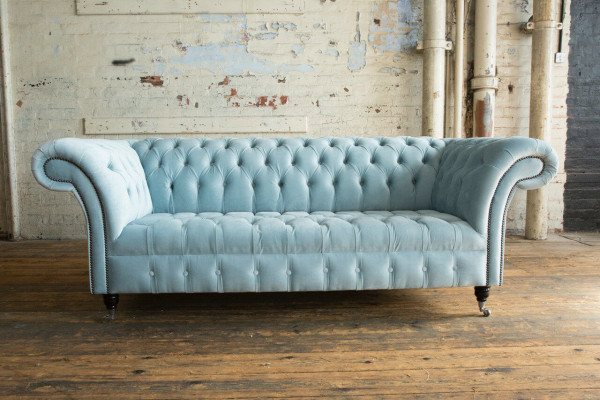Chesterfield sofá tapizado de 3 plazas en cuero estilo moderno azul.