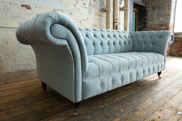 Chesterfield sofá tapizado de 3 plazas en cuero estilo moderno azul.