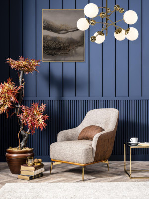 Sillón orejero moderno de tela de poliéster gris para salón de diseño.