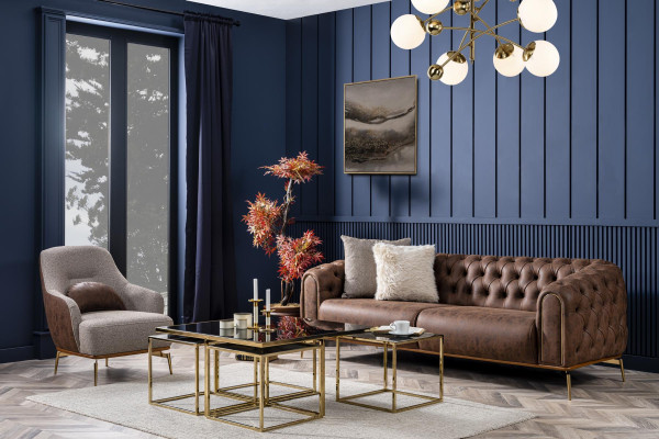 Sillón orejero moderno de tela de poliéster gris para salón de diseño.