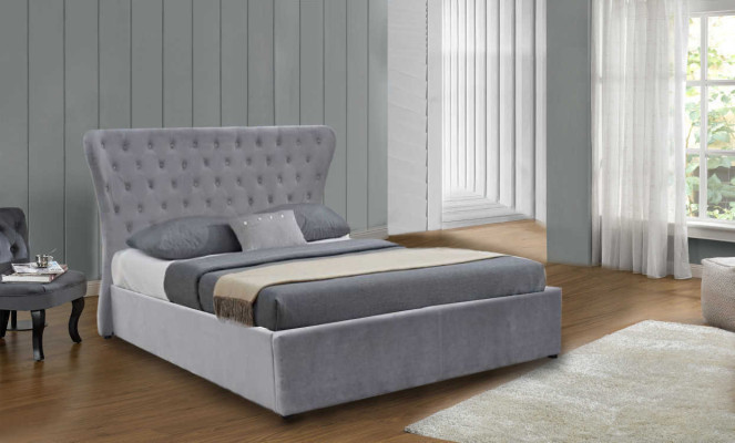 Cama doble Chesterfield de lujo en color gris. Cama de diseño para dormitorio.