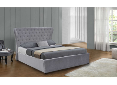Cama doble Chesterfield de lujo en color gris. Cama de diseño para dormitorio.