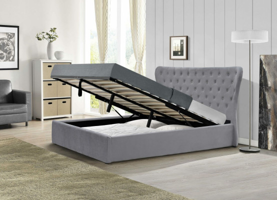 Cama doble Chesterfield de lujo en color gris. Cama de diseño para dormitorio.