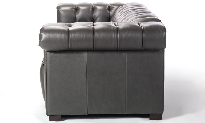 Diseñador Chesterfield negro de tres plazas para salón.