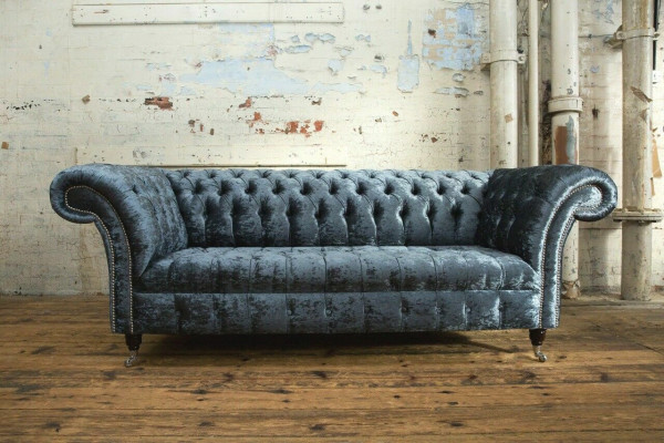 Sofá Chesterfield de diseño en textil para el salón de estar Sofás tres plazas gris.