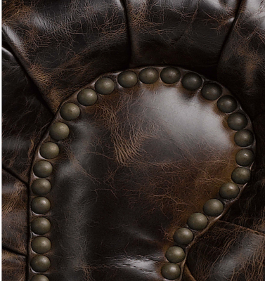 Moderno sofá chesterfield negro de tres plazas de lujo para sala de estar.