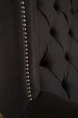 Sillón orejero asiento negro diseño tapizado Chesterfield textil nuevo.