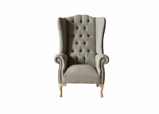 Sillón gris de orejas diseño tapizado Chesterfield textil sala de estar