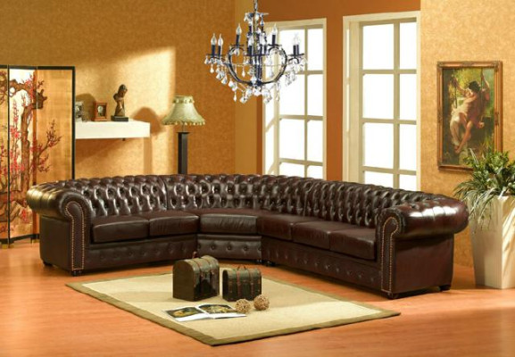 Sofá de esquina clásico Chesterfield con tapizado de esquina de cuero de sofá de sala de estar.