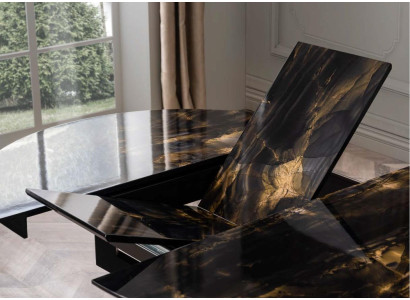Mesa redonda de comedor de diseño oscuro en color madera. Nuevo modelo para el comedor.