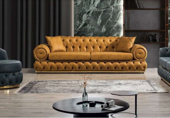Sofá de 3 plazas Chesterfield tapizado en cuero azul para la sala de estar.