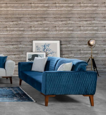 Sofá de tres plazas azul elegante para salón de terciopelo.
