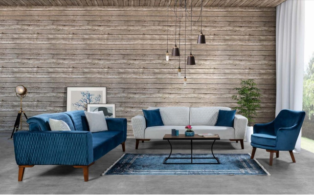 Sofá de tres plazas azul elegante para salón de terciopelo.