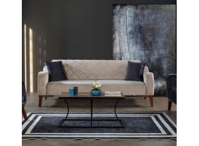 Sofá de tres plazas beige elegante para la sala de estar en terciopelo.