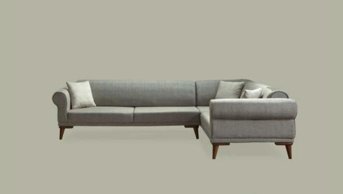 Sofá esquinero en forma de L con acolchado de lujo para sala de estar, estilo suave, color gris.