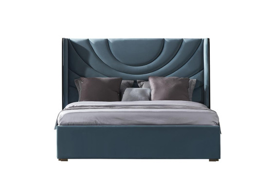 Cama doble hermosa con cabecero acolchado de estilo moderno.