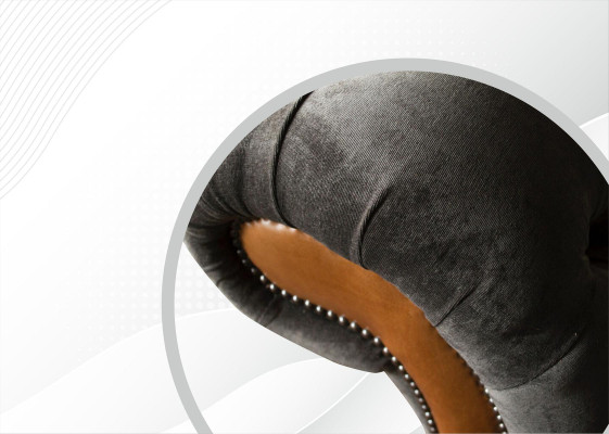Sillón Chesterfield de tela gris para diseño de lujo moderno del salón.