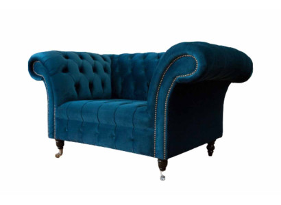 Sillón Chesterfield diseño sofá azul tela muebles.