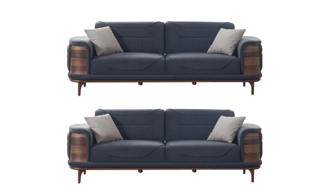 Dos sofás gris oscuro de estilo moderno con patas de madera para una sala de estar.