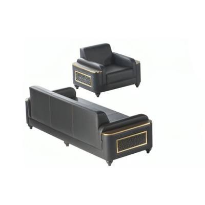 Estudio sofá de 3 plazas con sillón negro de estilo monocromático para salón.