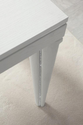 Mesa extensible de comedor de madera de lujo con diseño moderno.
