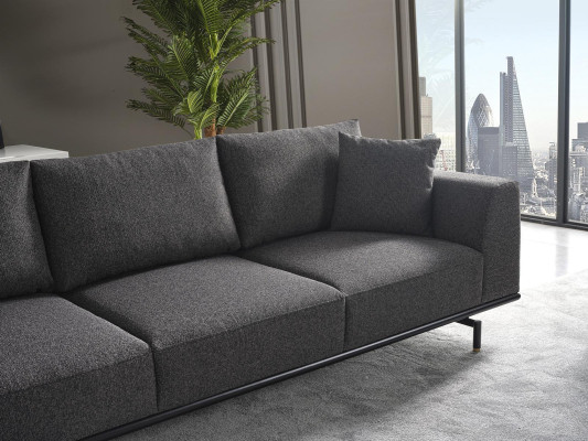Sofá de 4 plazas con sillón a juego de tela moderno en gris.