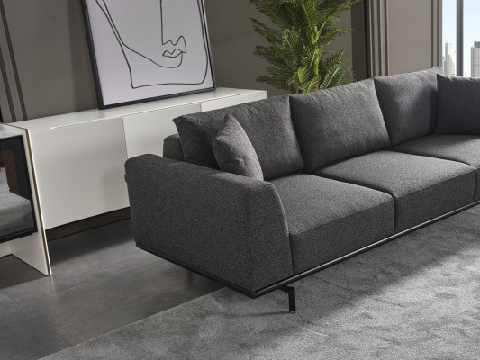 Sofá de 4 plazas con sillón a juego de tela moderno en gris.
