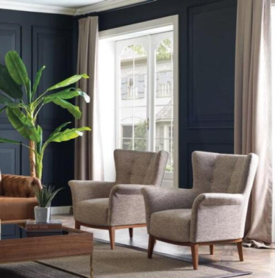 Silla Chesterfield de lujo tapizada en tela estilo moderno con madera.