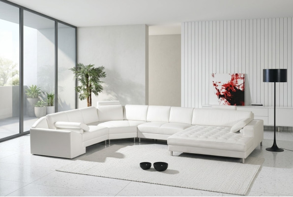 Moderno paisaje de sala con botones Chesterfield sofá de cuero sofá tapizado.