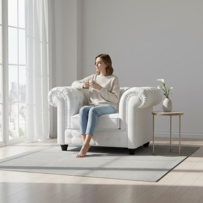 Sillón Chesterfield blanco elegante: El encanto de lo clásico en un estilo moderno.