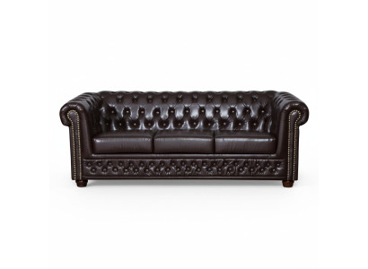 Moderno sofá Chesterfield de tres plazas en cuero sintético, acogedor y elegante.