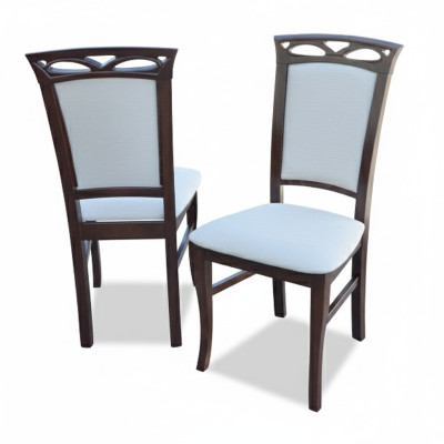 8x juego de sillas de comedor de diseñador con respaldo acolchado.
