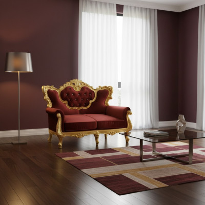 Sofá de 2 plazas elegante con una combinación de colores brillante de rojo noble y tono dorado brillante en estilo barroco.