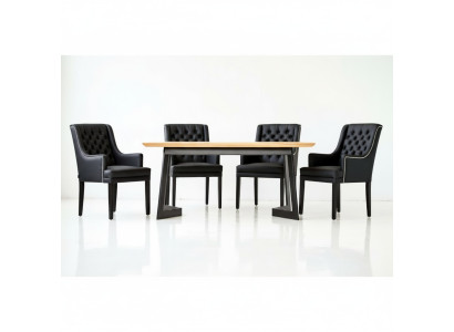 Moderno conjunto de comedor ovalado con sillas Chesterfield negras de diseño, 7 piezas.