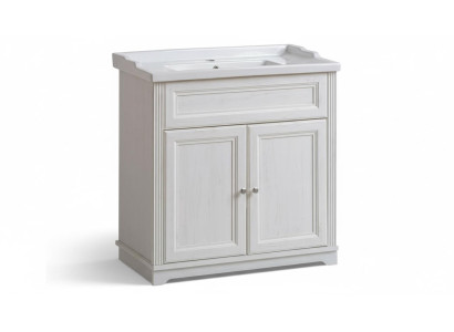 Mueble de baño de estilo antiguo con lavabo y armario inferior para baños rústicos.