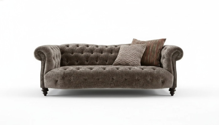 Sofá Chesterfield de tela y cuero para 3 personas.