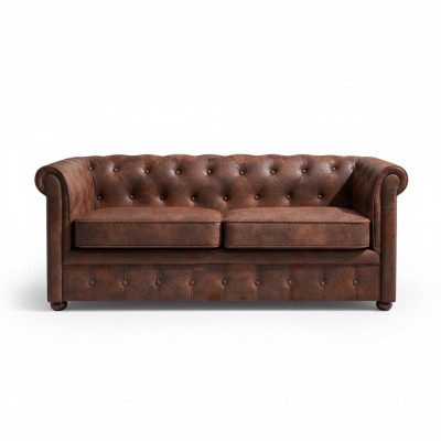 Sofá Chesterfield de lujo de cuero artificial para la sala de estar.