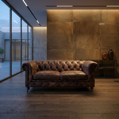 Sofá Chesterfield Club de Hombres marrón de cuero de tres plazas.