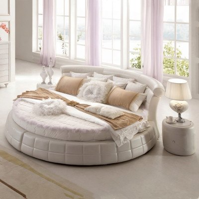 Camas redondas clásicas: cama redonda de diseñador de lujo tapizada en elegante cuero aterciopelado.