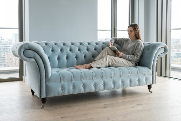 Chesterfield sofá tapizado de 3 plazas en cuero estilo moderno azul.