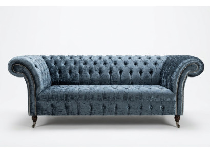 Sofá Chesterfield de diseño en textil para el salón de estar Sofás tres plazas gris.