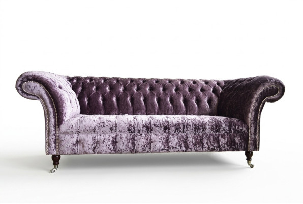 Elegante sofá Chesterfield lila de tres plazas para sala de estar de lujo