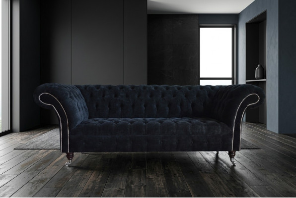 Sofá de lujo de tres plazas Chesterfield negro para la sala de estar.