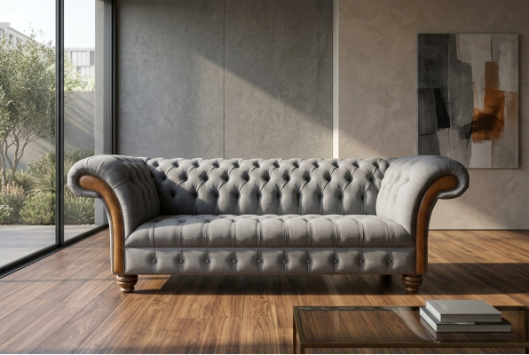 Noble y elegante sofá Chesterfield gris de tres plazas de lujo para sala de estar.