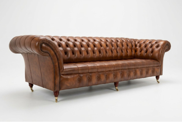 Chesterfield sofá de 4 plazas estilo moderno en cuero y tela.