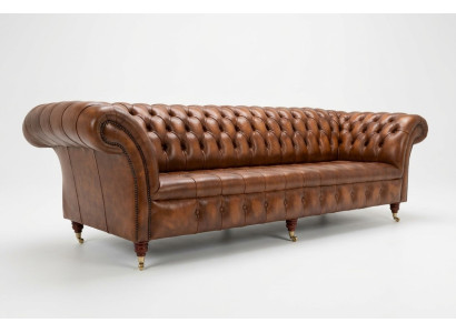 Chesterfield sofá de 4 plazas estilo moderno en cuero y tela.