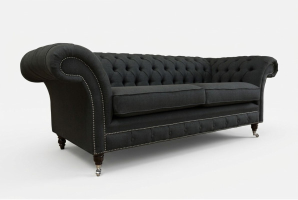 Sofá de lujo Chesterfield moderno de tres plazas negro.