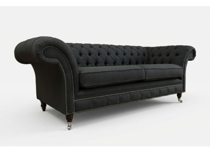 Sofá de lujo Chesterfield moderno de tres plazas negro.