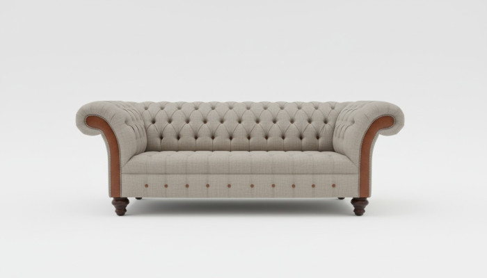 Sofá de diseño Chesterfield de tres plazas gris moderno.